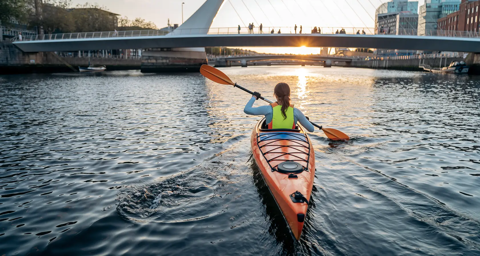 woman in kayak at Liffey River in Dublin - H2QO